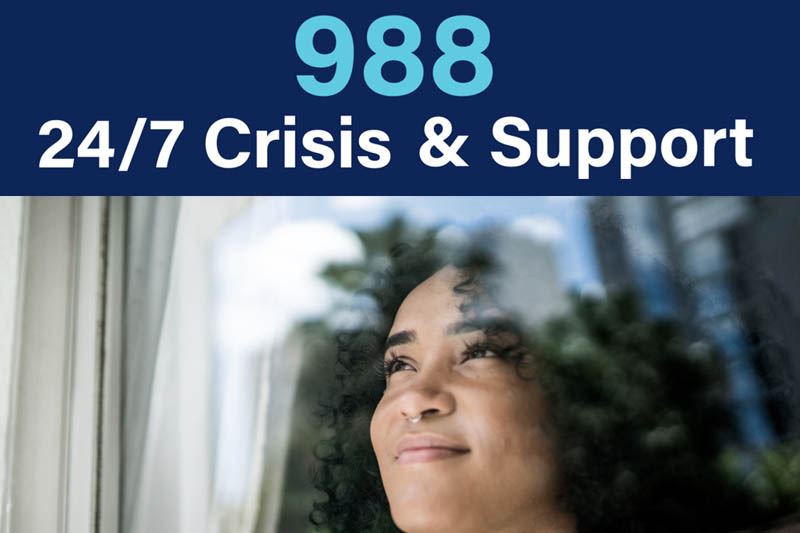 A woman looking through a window and text that reads 988 24/7 Crisis and Support
