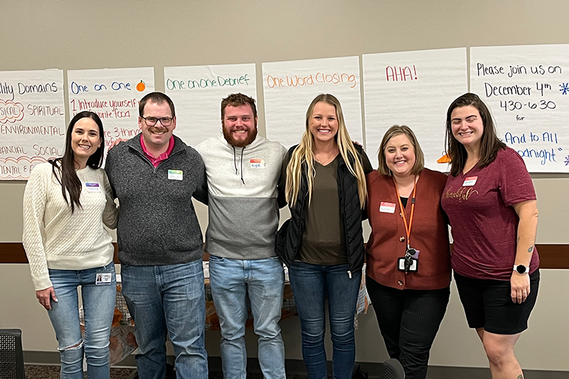Team members at a Recovering Together Cafe.