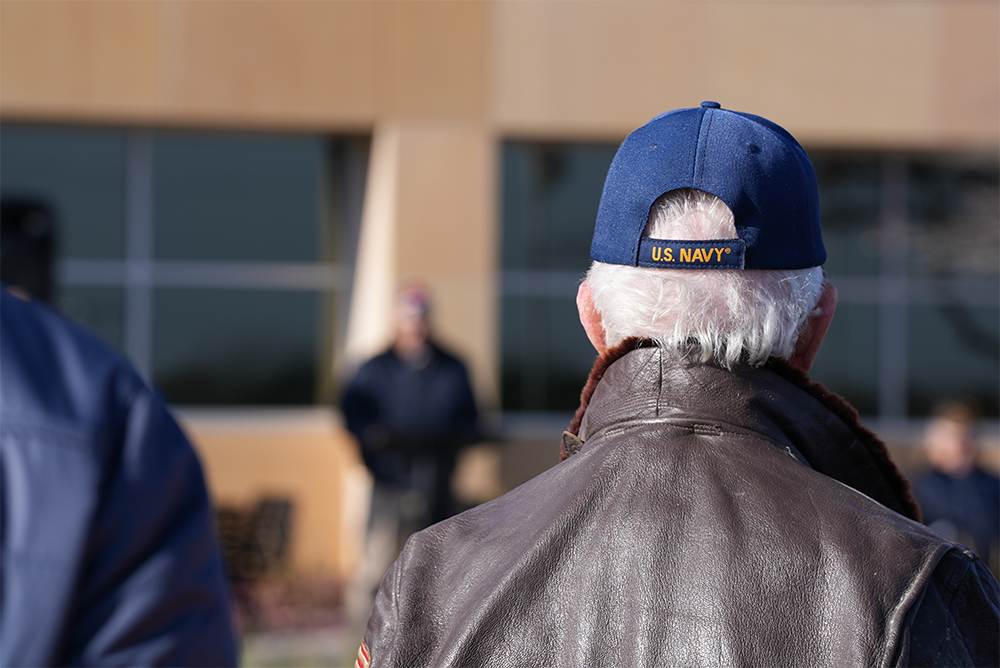 Veterans and crowd watching the 2025 St. Croix County Veterans Day Ceremony.