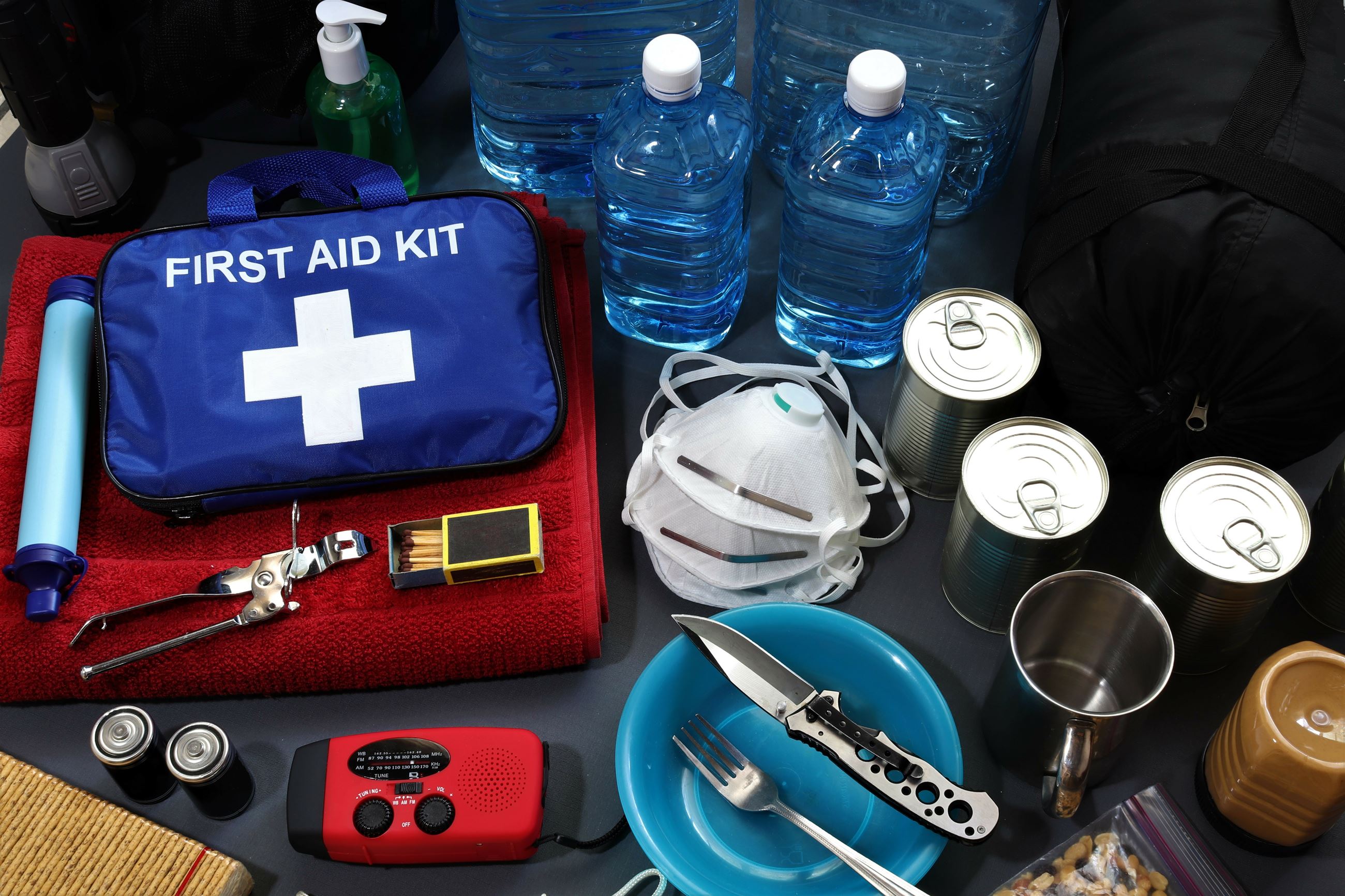 Disaster Kit with First Aid, Water, Canned Food, and Emergency Supplies